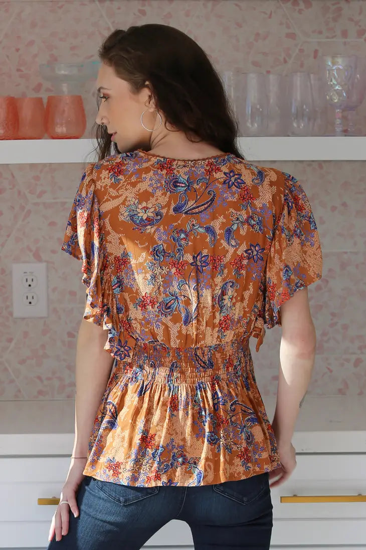 V NECK RUFFLE DETAIL SMOCKED WAIST BLOUSE