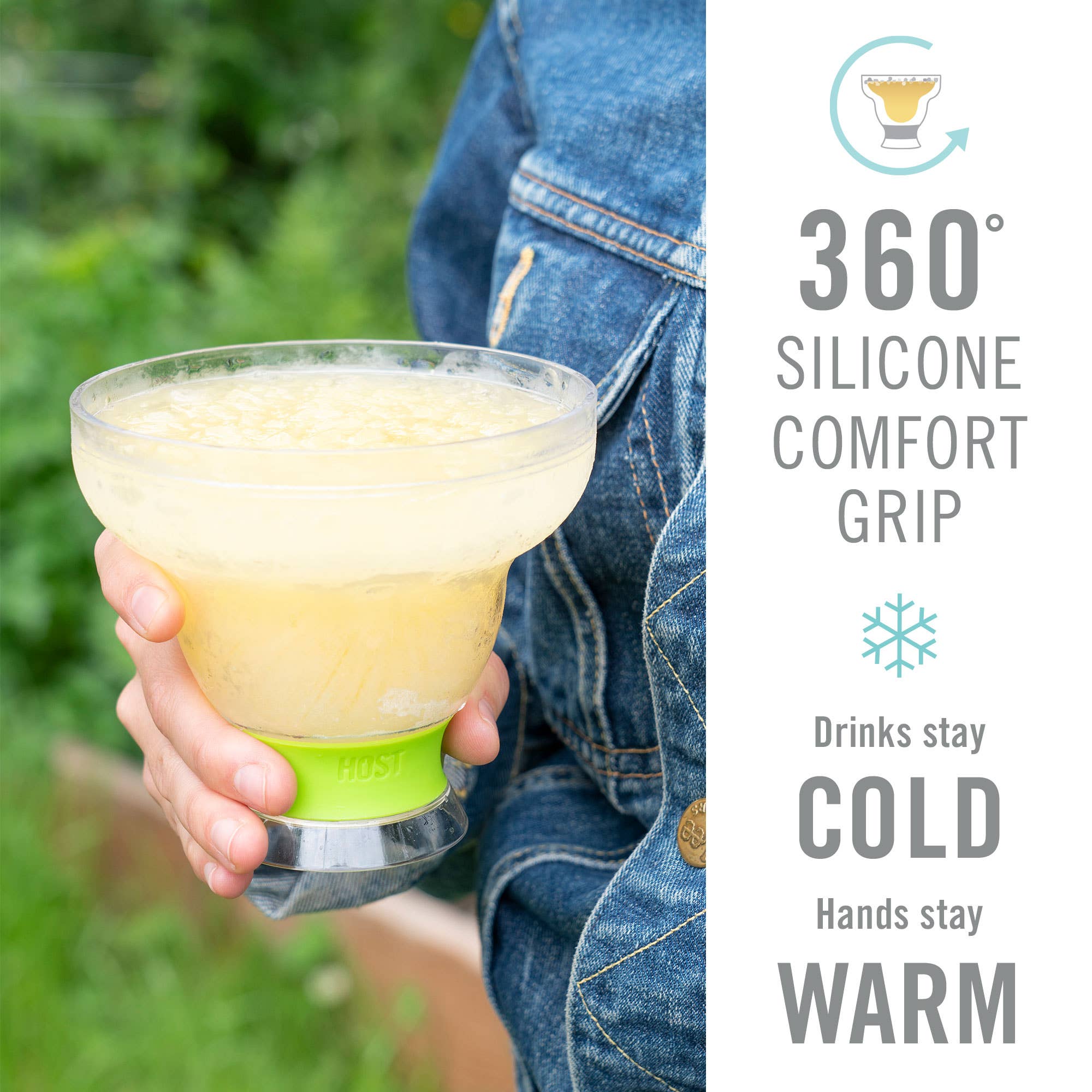 Green Margarita FREEZE™ insulated cooling cup with 360-degree silicone grip holding a frozen margarita outdoors