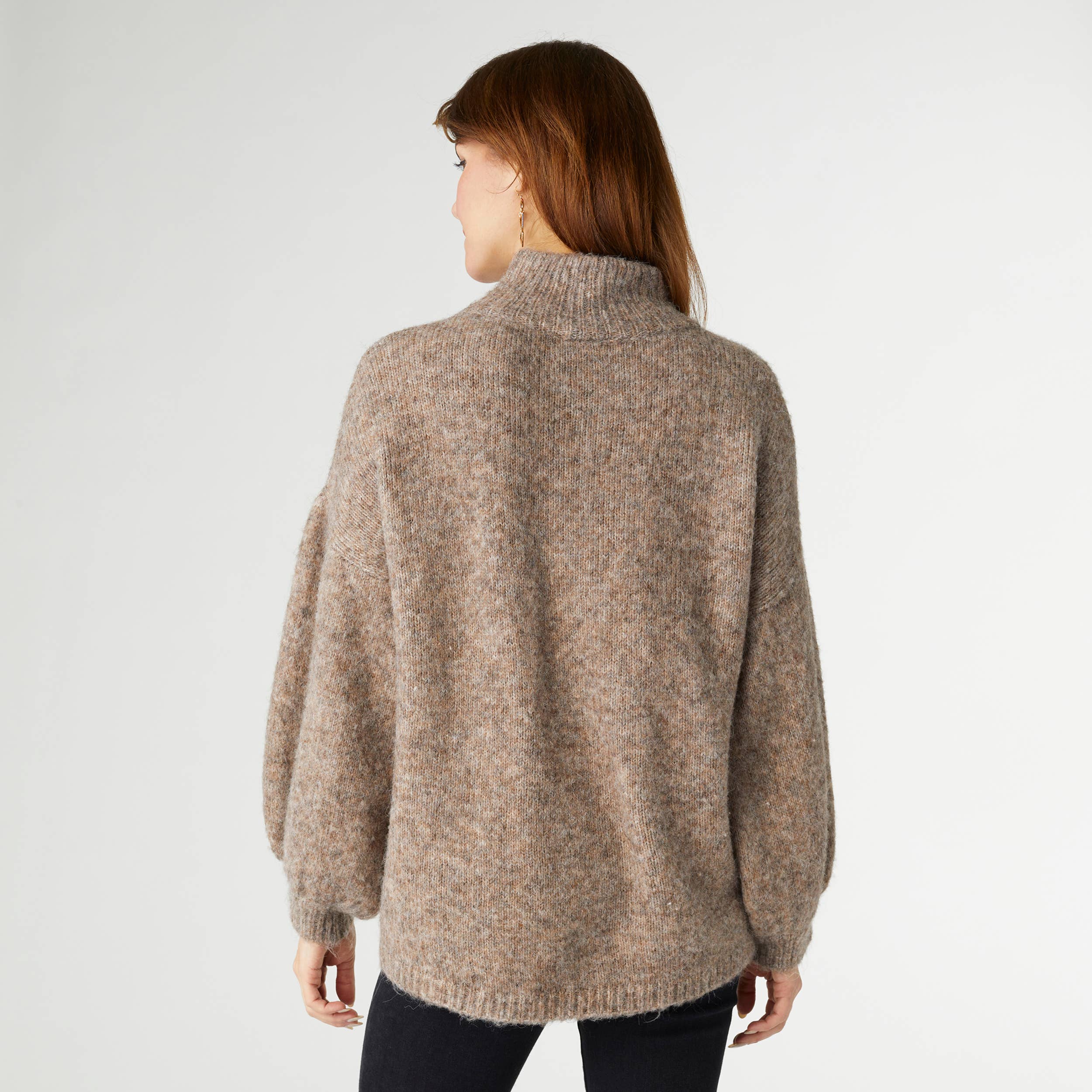 Back view of woman wearing Latte Heather Kayne mohair sweater with long sleeves and high collar
