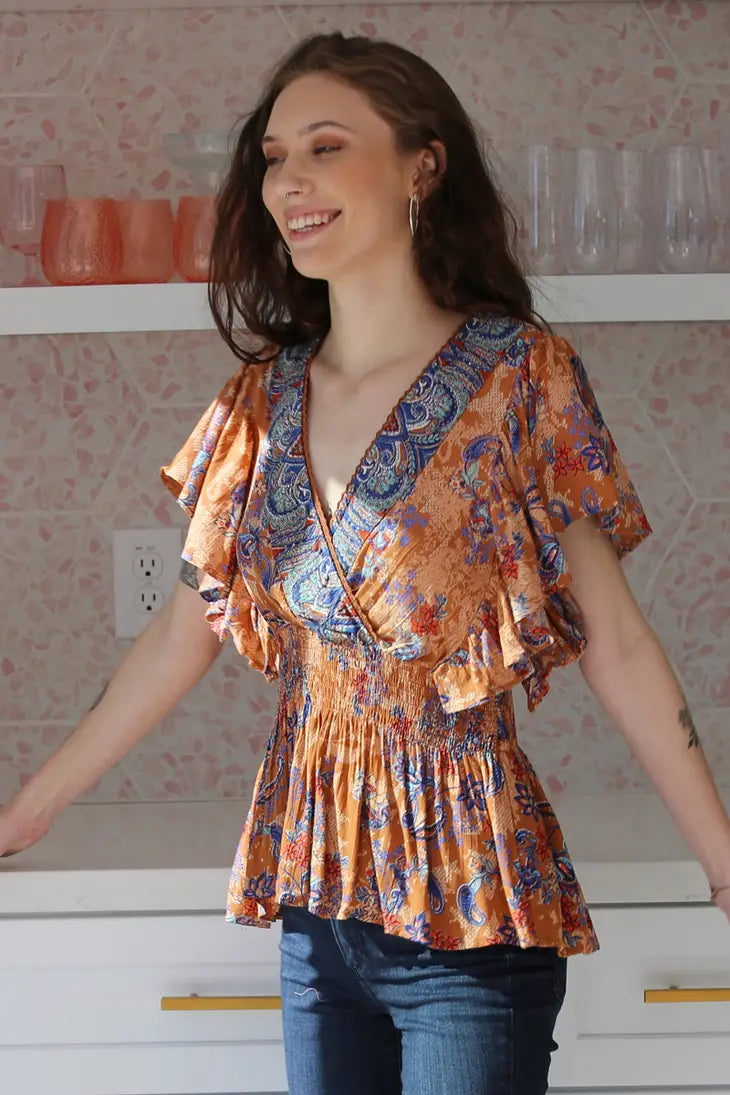V NECK RUFFLE DETAIL SMOCKED WAIST BLOUSE