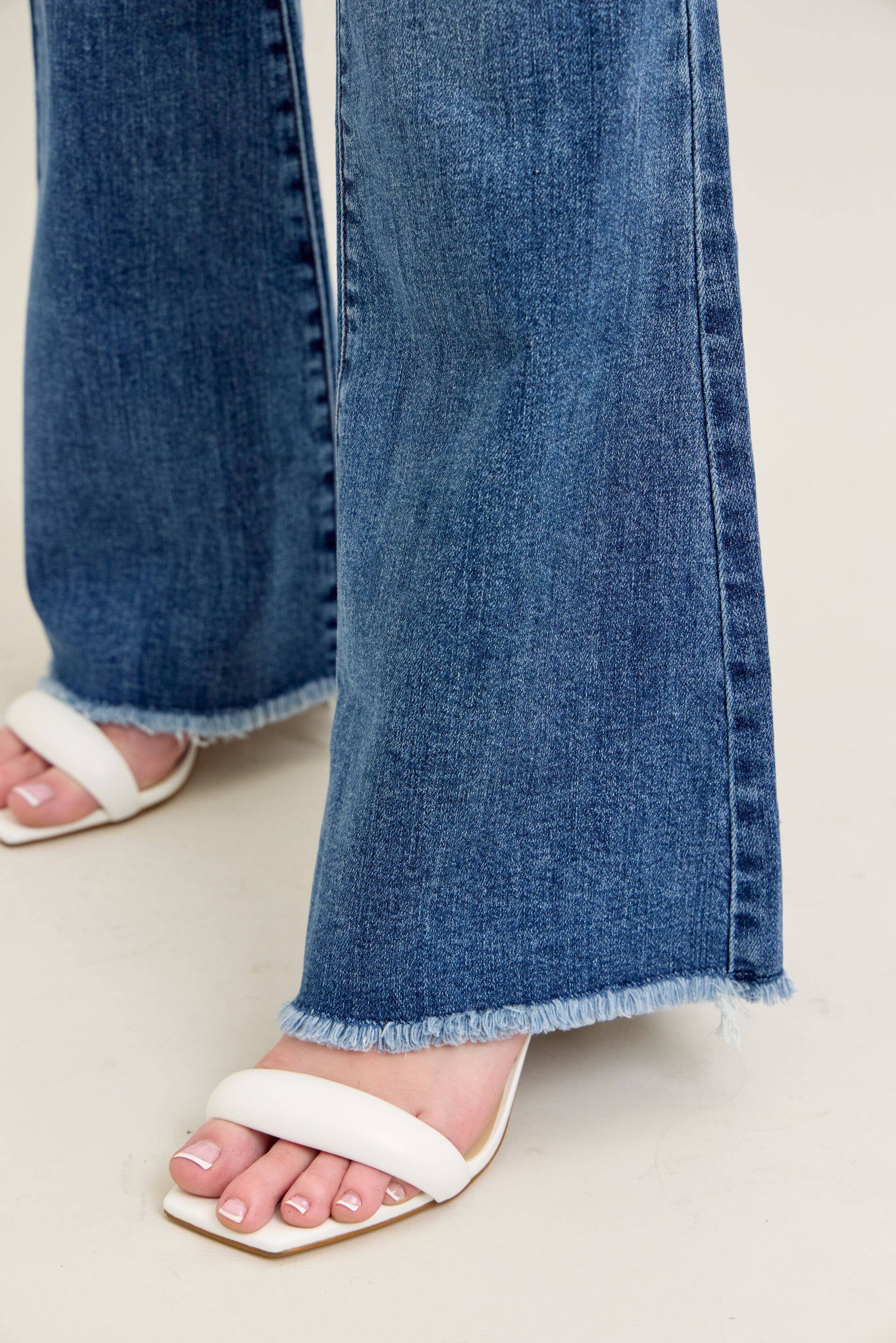 Mid Rise Vintage Wash Flare w/ Distressed and Fray Hem