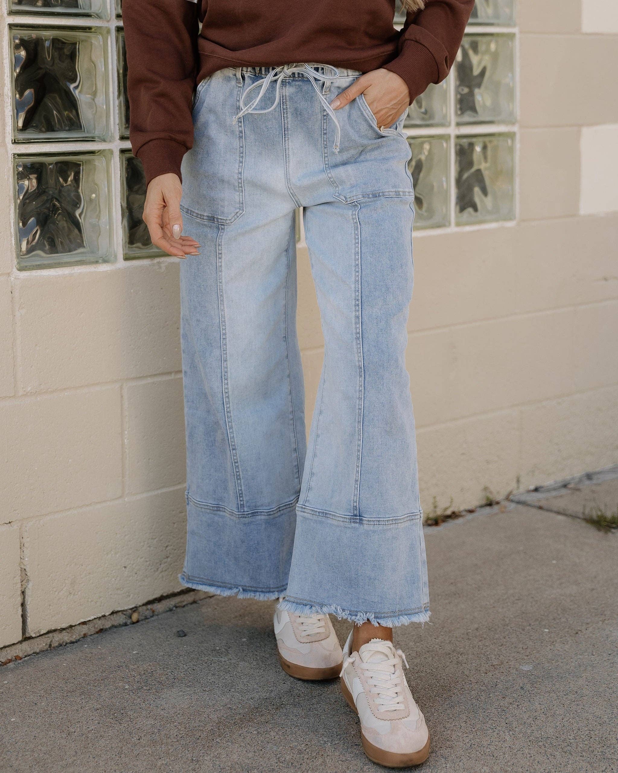 Beau Blue Cropped Jeans with wide leg, drawstring waist, raw hem, and seam detailing in soft stretch denim for women