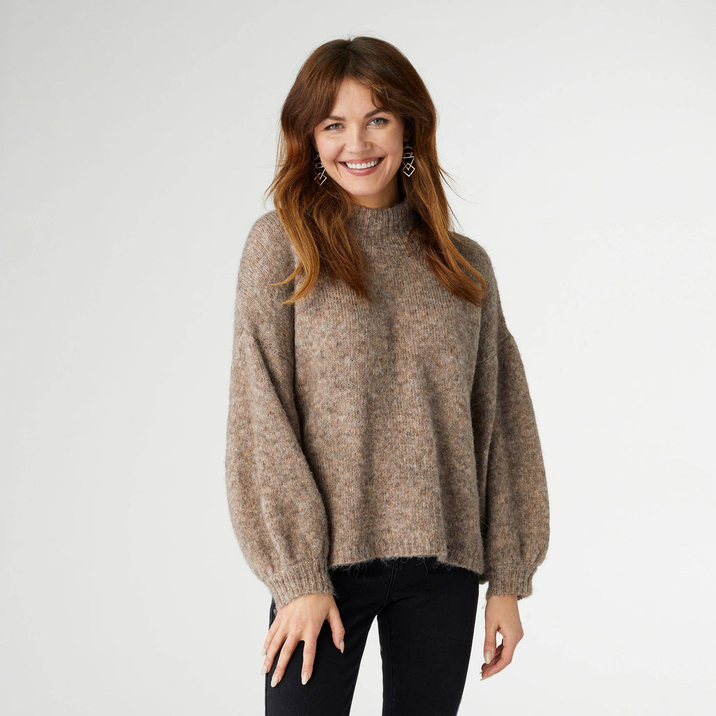 Woman wearing Latte Heather Kayne mohair sweater with long sleeves and relaxed fit