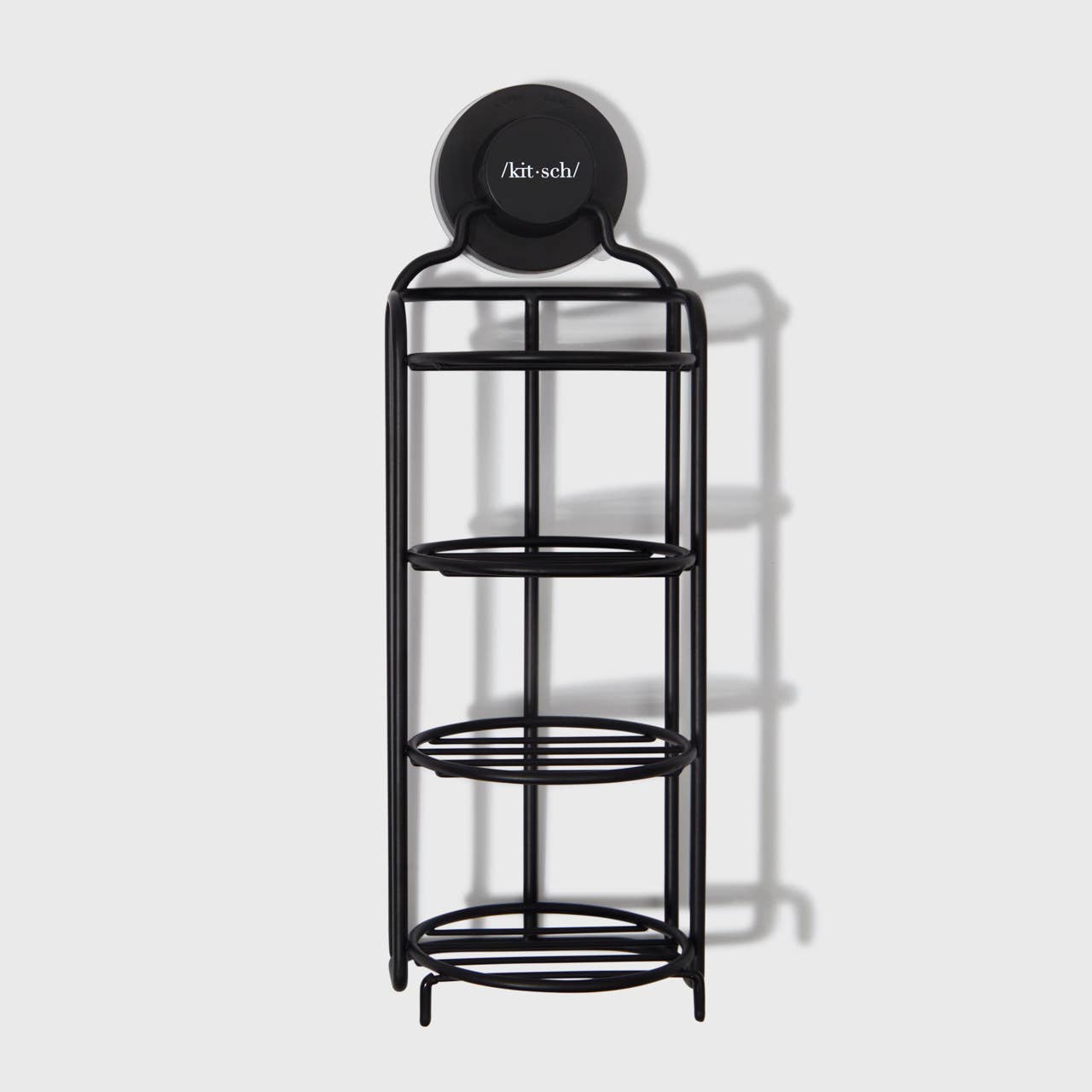Black self-draining shower caddy with multiple tiers, wall mount and free-standing legs, eco-friendly and rust-proof design.
