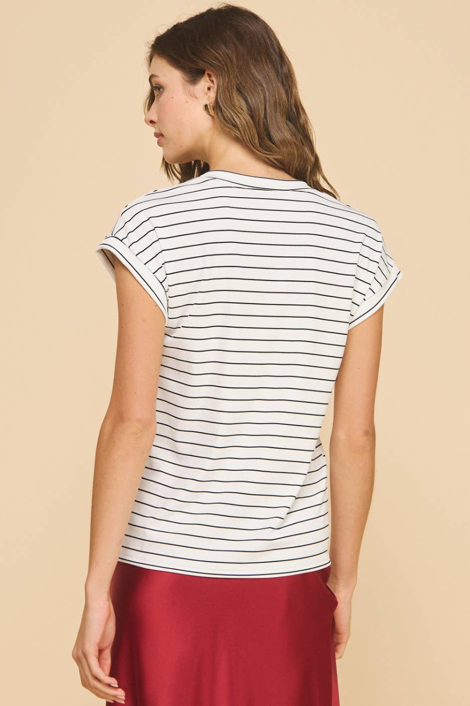 Model wearing Amicis Kate T-shirt with rib stripe cuffed crewneck, made in USA, size S