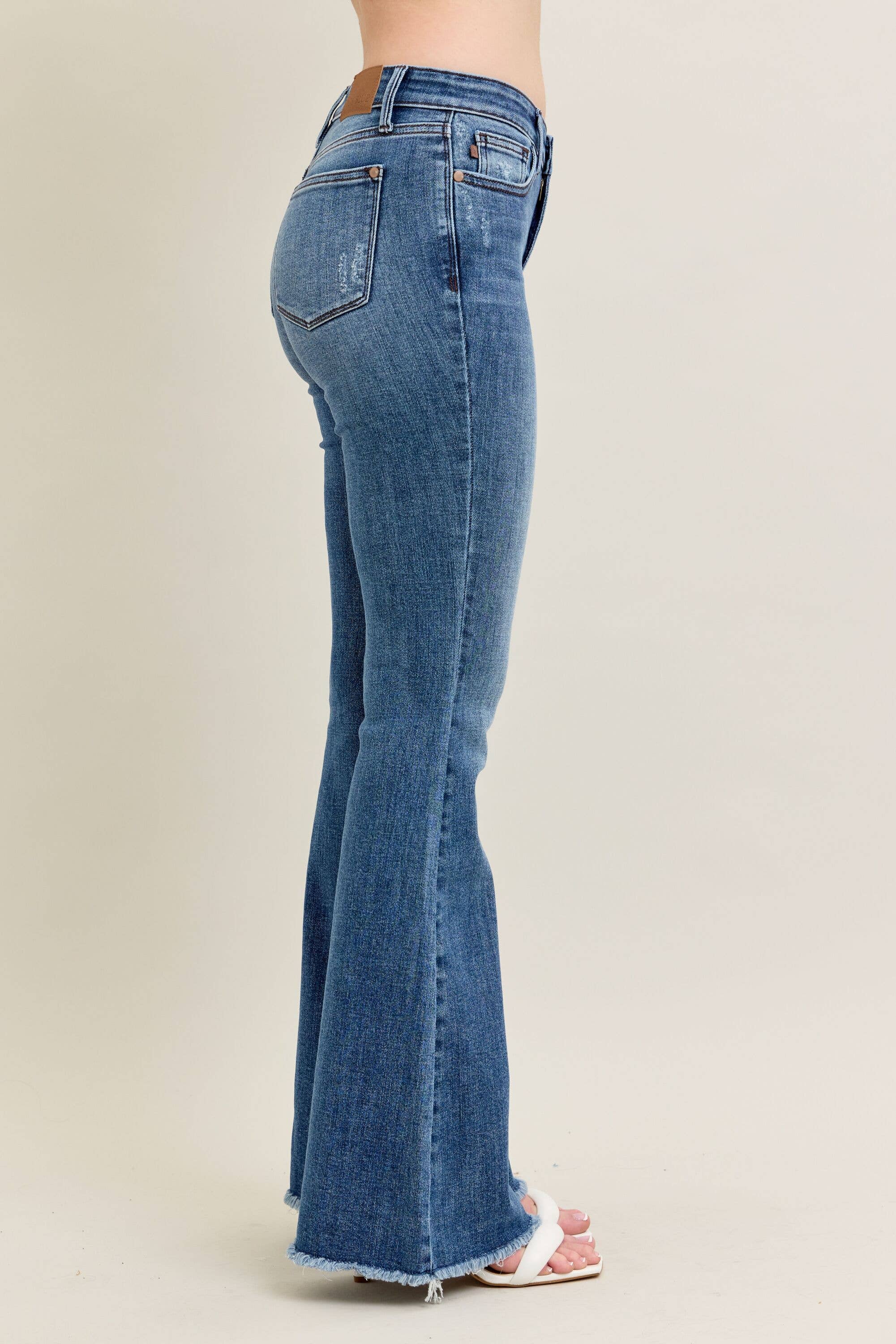Mid Rise Vintage Wash Flare w/ Distressed and Fray Hem