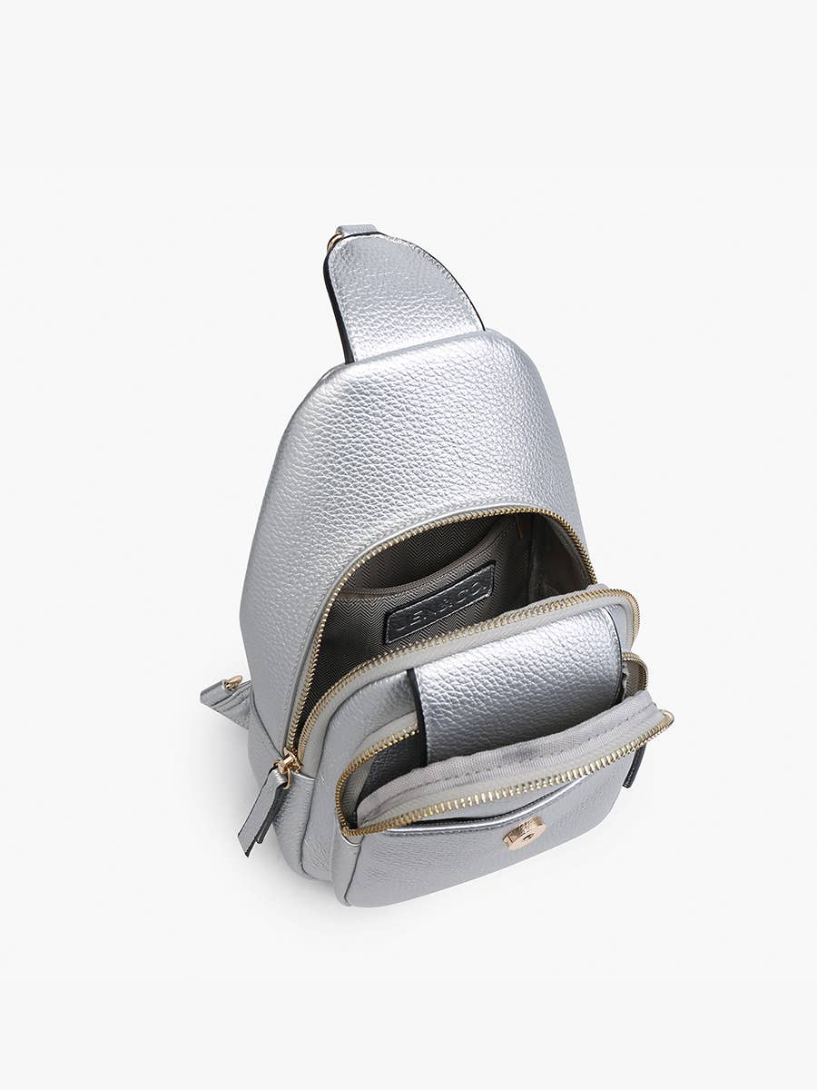 Sophia Sling Bag with flapover pocket, zipper opening, front snap and zipper pockets, adjustable strap, compact fall accessory