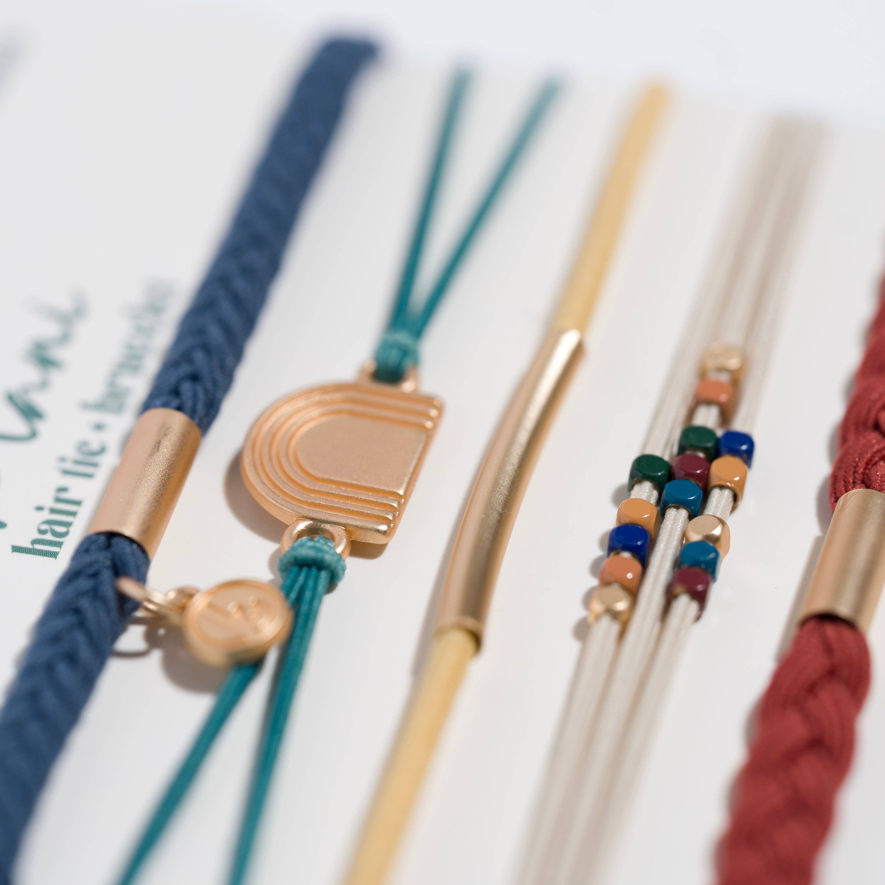 K'lani hair tie bracelets - "Imagine" Gold Rainbow Themed Hair Tie Bracelets