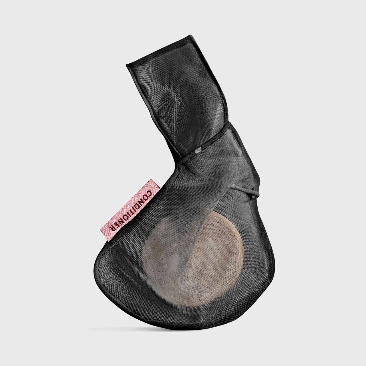 Black mesh Conditioner Beauty Bar bag with pink tag for drying and storing bars.